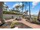Charming outdoor brick patio with a table and chairs, perfect for entertaining overlooking the ocean at 1212 Benjamin Franklin Dr # 901, Sarasota, FL 34236