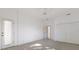 Spacious bedroom with neutral carpet, ceiling fan and double closet at 1217 92Nd Nw St, Bradenton, FL 34209