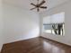 Bedroom featuring hardwood floors and natural light from a window at 1217 92Nd Nw St, Bradenton, FL 34209