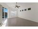 Bedroom featuring a sliding door to the pool, ceiling fan, and natural light at 1217 92Nd Nw St, Bradenton, FL 34209