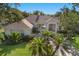 Inviting home with mature landscaping and lush green lawn at 1217 92Nd Nw St, Bradenton, FL 34209