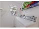 Bright laundry room with modern washer and dryer at 1217 92Nd Nw St, Bradenton, FL 34209