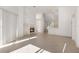 Bright living room with fireplace and open floor plan leading to the kitchen at 1217 92Nd Nw St, Bradenton, FL 34209