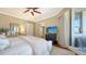 Bright primary bedroom with balcony access and lots of storage at 1281 Gulf Of Mexico Dr # 906, Longboat Key, FL 34228