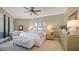 Spacious primary bedroom featuring sitting area and large windows with lots of natural light at 1281 Gulf Of Mexico Dr # 906, Longboat Key, FL 34228