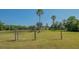 Expansive backyard with a playset offers plenty of space for recreation and outdoor enjoyment at 13625 3Rd Ne Ave, Bradenton, FL 34212