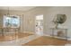 Elegant dining room connected to living spaces, featuring modern decor and natural light at 13625 3Rd Ne Ave, Bradenton, FL 34212