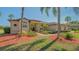 Charming home with well-maintained lawn, lush landscaping, and mature trees at 13625 3Rd Ne Ave, Bradenton, FL 34212