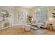 Cozy living room featuring modern decor, including artwork and plants, creating a welcoming space at 13625 3Rd Ne Ave, Bradenton, FL 34212