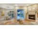 Open concept living area with fireplace, modern decor, and dining area in view at 13625 3Rd Ne Ave, Bradenton, FL 34212