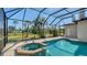 Gorgeous screened pool and spa area provides a private backyard sanctuary for relaxation and recreation at 13625 3Rd Ne Ave, Bradenton, FL 34212