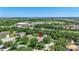 Bird's-eye view of home in a mature community, showcasing the expansive neighborhood, nearby shopping, and convenient location at 14104 E 22Nd Ter, Bradenton, FL 34212