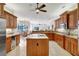 Well-equipped kitchen with custom wood cabinetry and a spacious center island at 14104 E 22Nd Ter, Bradenton, FL 34212