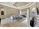 Bright living area with modern decor, tile flooring, and a view of the pool area at 14104 E 22Nd Ter, Bradenton, FL 34212