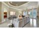 Elegant living room with a large sofa and views of other rooms within the property at 14104 E 22Nd Ter, Bradenton, FL 34212