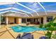 Stunning pool area with a large pool, screened enclosure, and ample space for lounging and entertaining at 14104 E 22Nd Ter, Bradenton, FL 34212