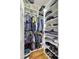 Custom walk-in closet with ample storage, shelving, and hanging space at 14104 E 22Nd Ter, Bradenton, FL 34212