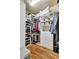 Organized walk-in closet featuring custom shelving, drawers, and ample storage space at 14104 E 22Nd Ter, Bradenton, FL 34212