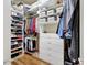 Walk-in closet featuring custom shelving, drawers, and ample storage space at 14104 E 22Nd Ter, Bradenton, FL 34212