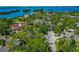 An aerial view capturing the lush landscaping and well-maintained streets at 1532 Pelican Point Dr # 240, Sarasota, FL 34231