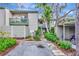 Inviting condo with lush landscaping, covered parking, and private entrances at 1532 Pelican Point Dr # 240, Sarasota, FL 34231