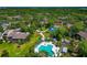 Overhead view of community pool, mature landscaping, and beautiful manicured common areas at 1532 Pelican Point Dr # 240, Sarasota, FL 34231