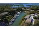 Aerial view showcasing the community's private boat docks and water access at 1532 Pelican Point Dr # Ba139, Sarasota, FL 34231