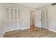 Bedroom with hardwood floors has great closet space at 1532 Pelican Point Dr # Ba139, Sarasota, FL 34231