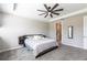 This bedroom features neutral colors, and a modern headboard with attached nightstands and storage at 16134 Paynes Mill Dr, Bradenton, FL 34211