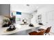 Bright kitchen featuring a breakfast bar, modern appliances, and countertops at 16622 San Nicola Pl, Bradenton, FL 34211