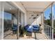 Cozy balcony featuring comfortable seating, lush greenery, and a peaceful outdoor retreat at 1714 69Th W Ave # C402, Bradenton, FL 34207