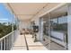 Spacious balcony with an outdoor seating area, offering scenic views and a relaxing atmosphere at 1714 69Th W Ave # C402, Bradenton, FL 34207