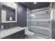 Stylish bathroom featuring modern fixtures, a glass enclosed shower and contemporary vanity at 1714 69Th W Ave # C402, Bradenton, FL 34207