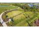 Spacious dog park featuring separate fenced areas, mature trees, and ample space for pets to exercise and socialize at 17620 Crescent Moon Loop, Bradenton, FL 34211