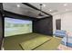 Community building featuring a golf simulator at 17620 Crescent Moon Loop, Bradenton, FL 34211