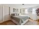 Inviting bedroom featuring natural light, soft textures, and calming decor at 2105 Georgia Ave, Englewood, FL 34224