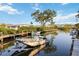 This waterfront dock provides a serene setting to enjoy boating at 2105 Georgia Ave, Englewood, FL 34224