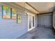 Enclosed back porch with painted murals at 2400 Stanford Ave, Bradenton, FL 34207