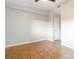 Bright bedroom featuring tile flooring, neutral walls, and recessed lighting at 2400 Stanford Ave, Bradenton, FL 34207