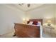 Simple bedroom with ceiling fan and bedside tables, providing a calm and relaxing atmosphere at 241 Willow Bend Way, Osprey, FL 34229