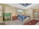 Light-filled bedroom with tiled floors, a ceiling fan, and a serene atmosphere, perfect for rest at 241 Willow Bend Way, Osprey, FL 34229
