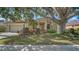 Charming single-story home features a well-manicured lawn and mature landscaping, creating inviting curb appeal at 241 Willow Bend Way, Osprey, FL 34229