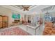 Inviting living room featuring a large window, tile floor and comfortable seating at 241 Willow Bend Way, Osprey, FL 34229