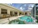 Backyard pool and patio area with fountain feature at 241 Willow Bend Way, Osprey, FL 34229