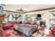 Spacious bedroom with ceiling fan, mirrored wall, and furniture at 2417 6Th Avenue E Dr, Bradenton, FL 34208
