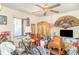 Bedroom with ceiling fan, furniture, a bicycle and a lamp on the table at 2417 6Th Avenue E Dr, Bradenton, FL 34208
