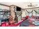 Spacious bedroom with ceiling fan, a fireplace and furniture at 2417 6Th Avenue E Dr, Bradenton, FL 34208
