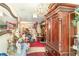 Inviting foyer with tile flooring, decorative mirror, and classic furnishings at 2417 6Th Avenue E Dr, Bradenton, FL 34208