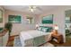 Stylish bedroom with a comfortable bed, coordinated decor, and lots of natural light at 2819 Swifton Dr # 9, Sarasota, FL 34231