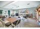 Spacious clubhouse features tables, chairs, and a library bookshelf at 2819 Swifton Dr # 9, Sarasota, FL 34231